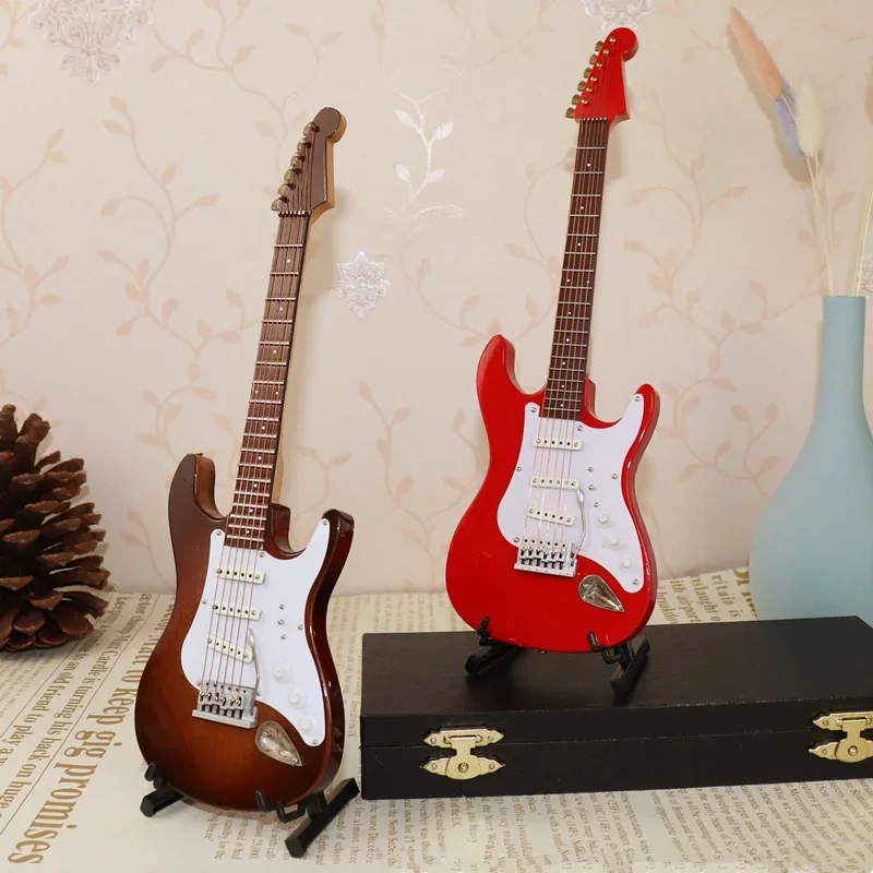 kf-S11b4deaf76d146be95c352023c0021beQ.webp Wooden Musical Instruments Collection Decorative Ornaments Mini Electric Guitar With Support Miniature Model Decoration Gifts - Image 1